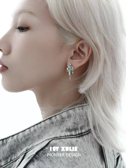 Side view of a model wearing Y2K mystic earrings that feature a unique design for a trendy look