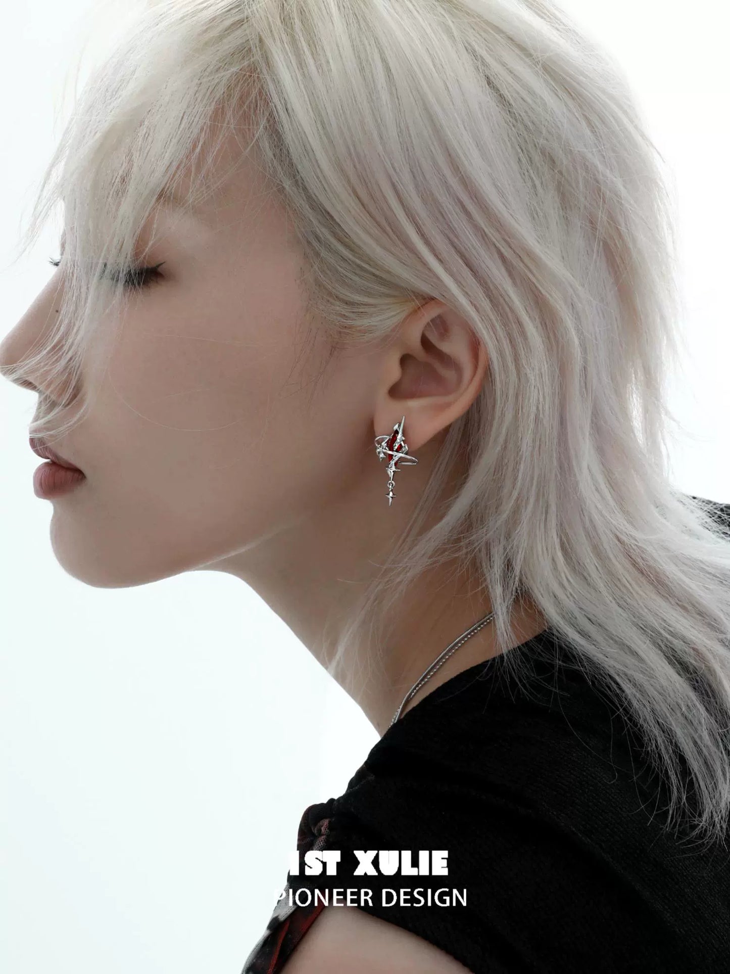 Chic model wearing Y2K mystic earrings showcasing a unique design and bold style
