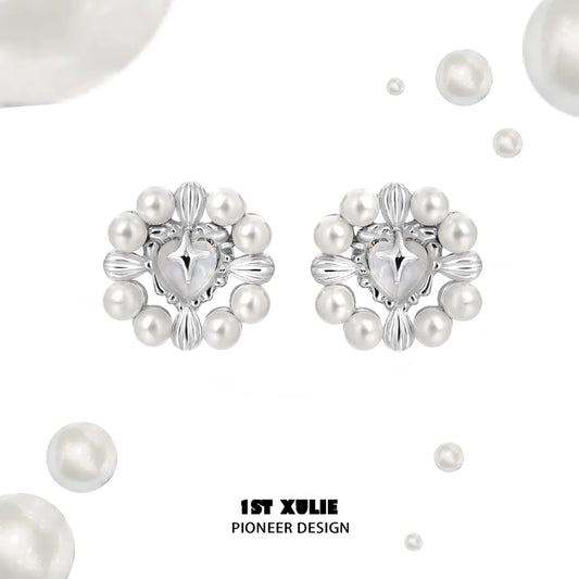 Y2K pearl earrings with intricate silver design and multiple pearl accents for a trendy look