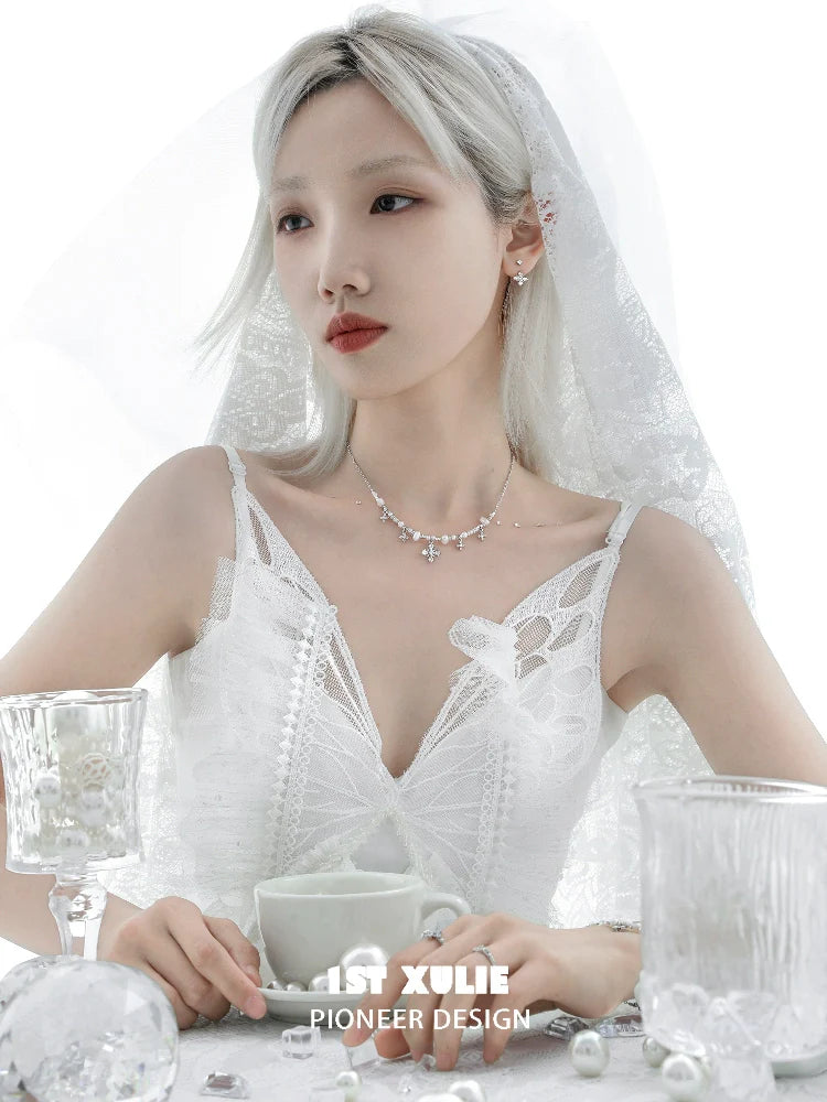 Elegant Y2K pearl necklace worn by a model in a bridal setting with a lace dress