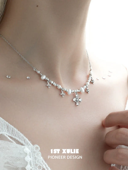 Y2K pearl necklace featuring delicate silver accents and floral designs for a trendy look