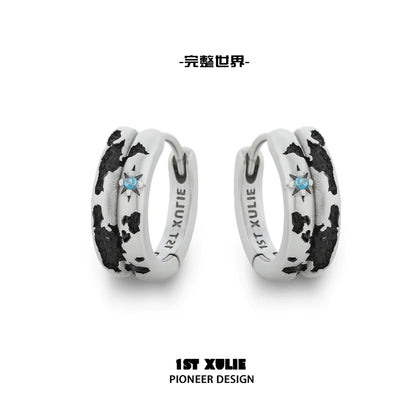 1ST XULIE Y2K planetary earrings with a unique design featuring black and white colors