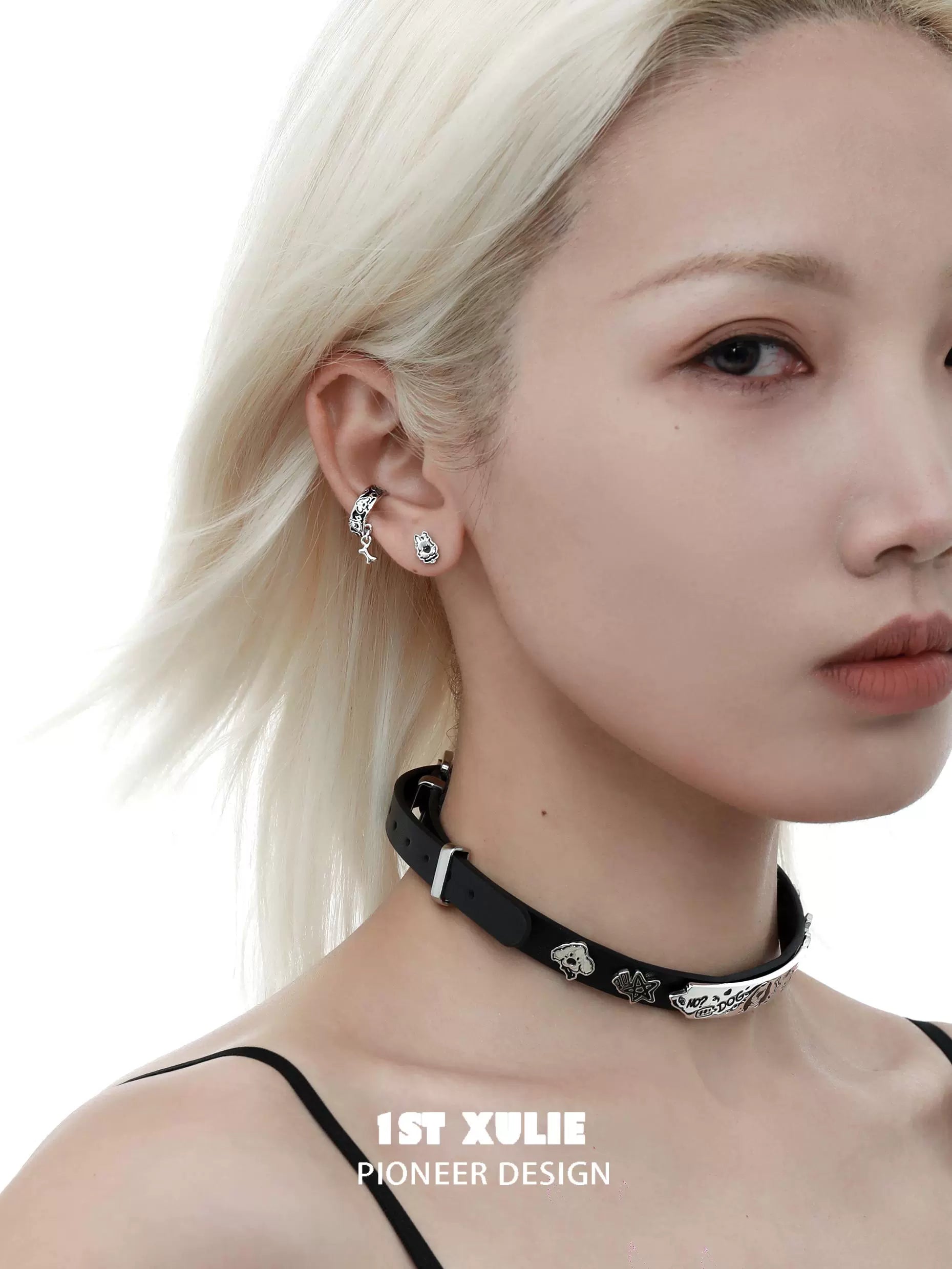Fashionable Y2K puppy chain earrings paired with a stylish choker for a trendy look