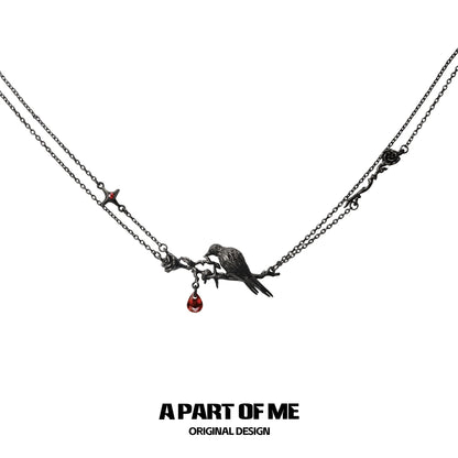 Y2K raven rose necklace with intricate design and red gemstone detailing from A PART OF ME