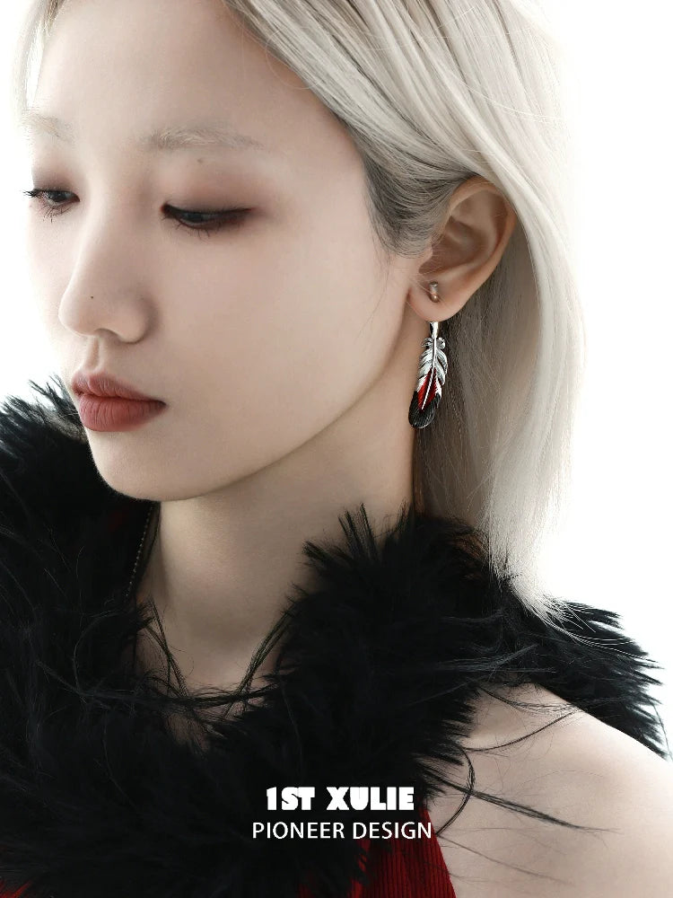 Y2K red feather earrings showcasing a trendy design, perfect for adding flair to any outfit