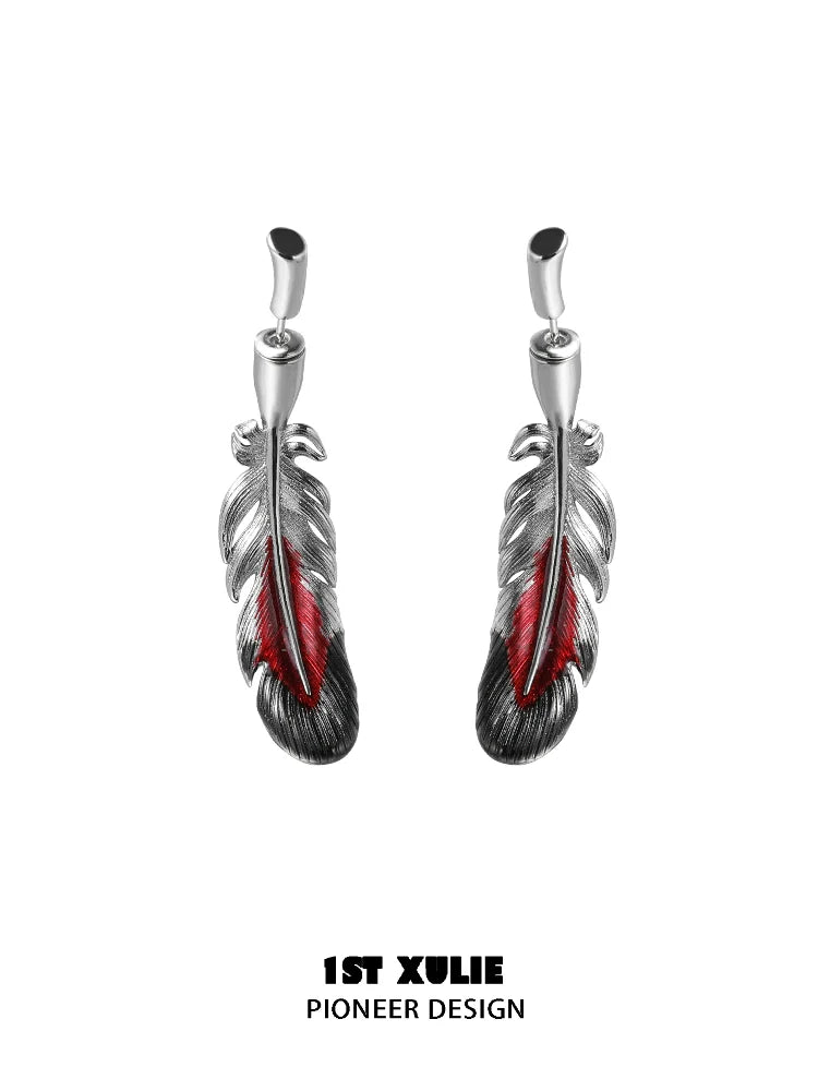Y2K red feather earrings featuring silver accents and intricate detailing for a trendy look