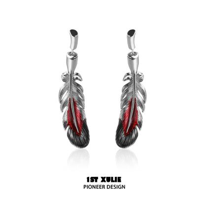 Y2K red feather earrings with silver detailing, perfect for a trendy fashion statement