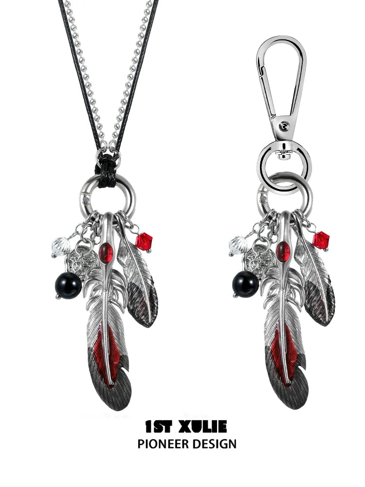 Y2K red witch feather necklace with silver feathers and gemstone accents for a mystical aesthetic