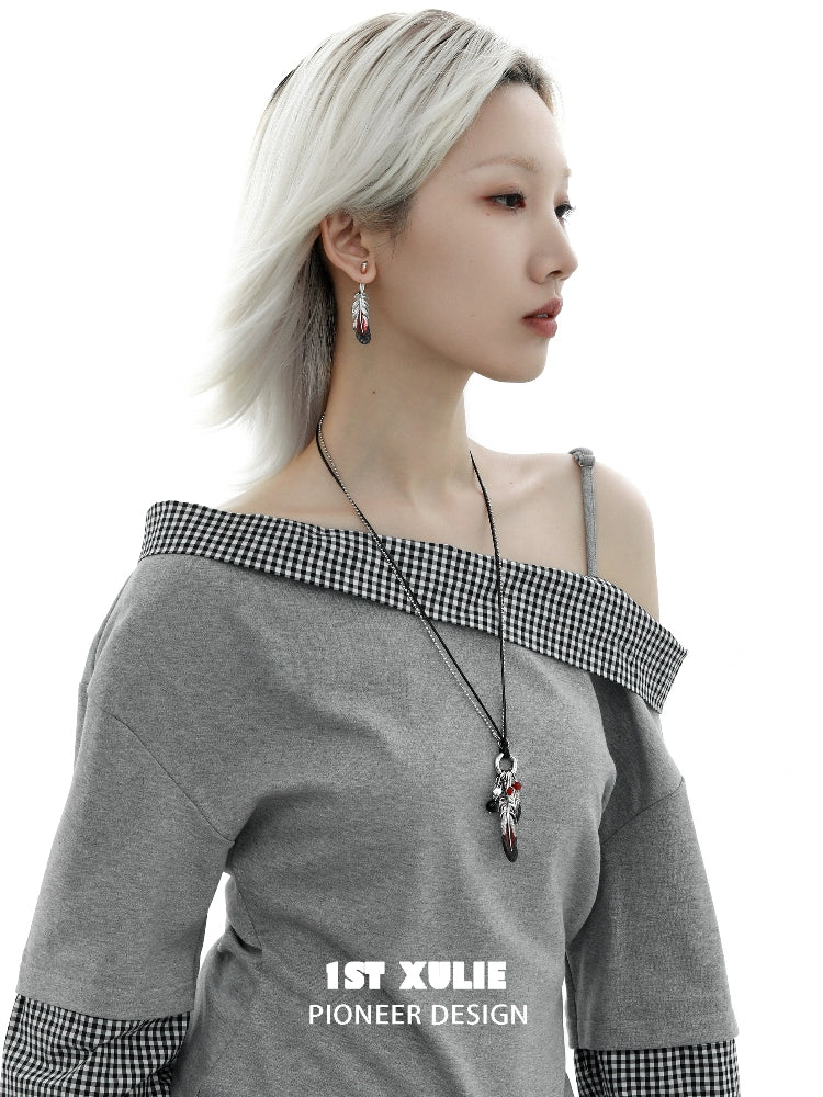 Model wearing Y2K red witch feather necklace paired with off-shoulder gray top for a stylish look