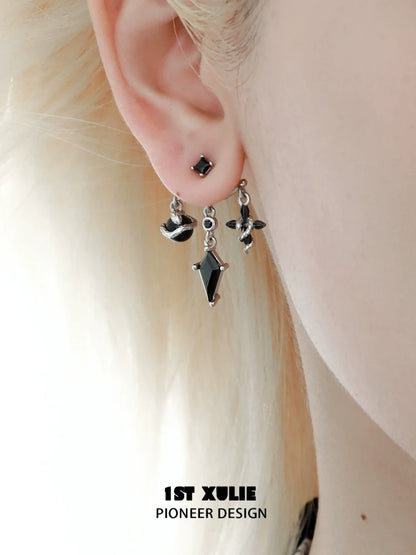Y2K snake earrings by 1STXULIE featuring black geometric charms for a trendy look