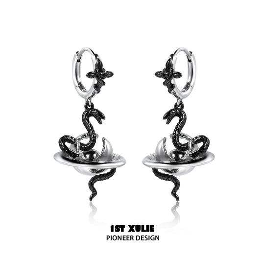 Sleek y2k snake earrings featuring a striking snake design with a shiny silver finish