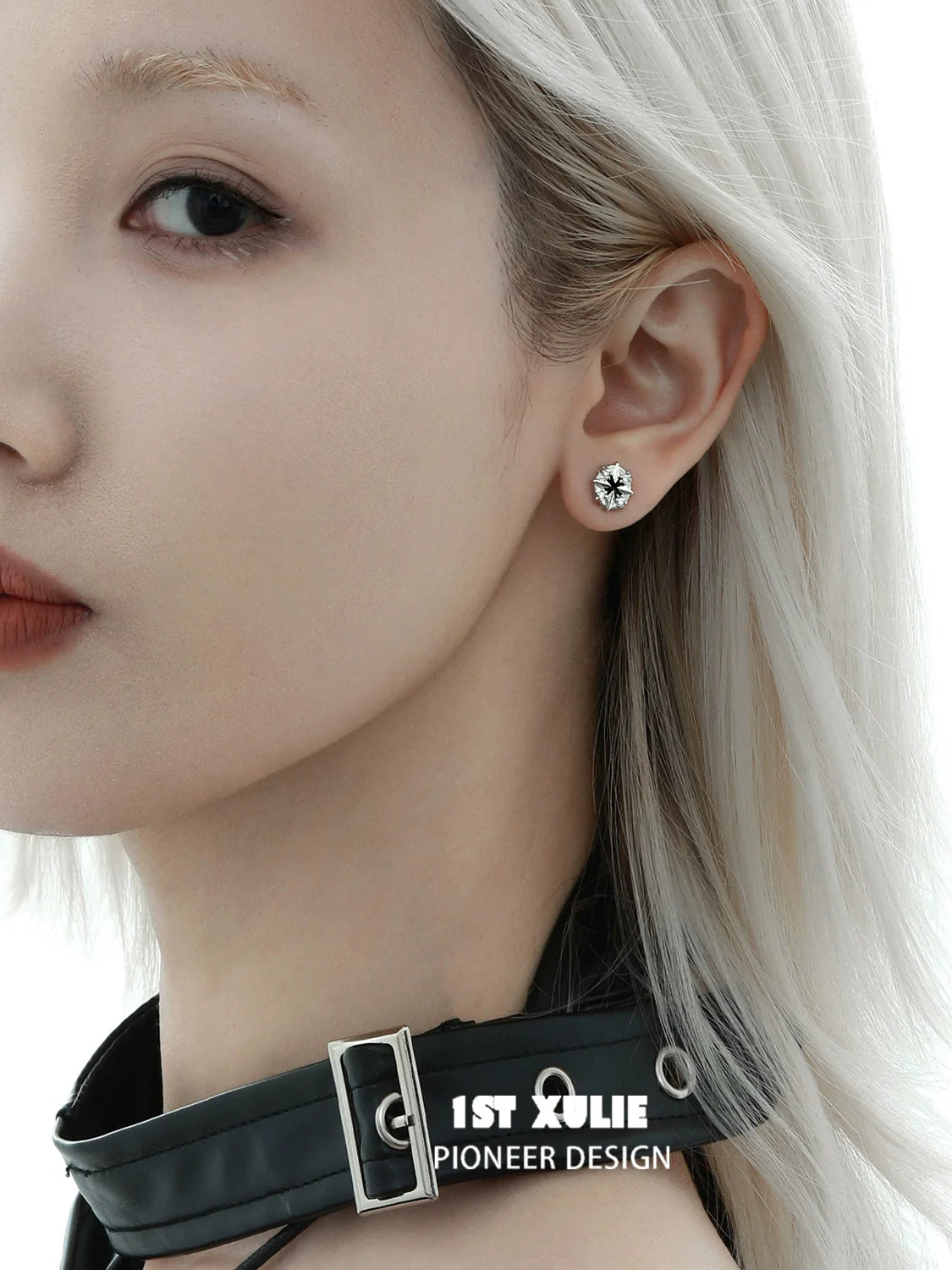 Model wearing Y2K star earrings designed by 1STXULIE, featuring a shiny star design
