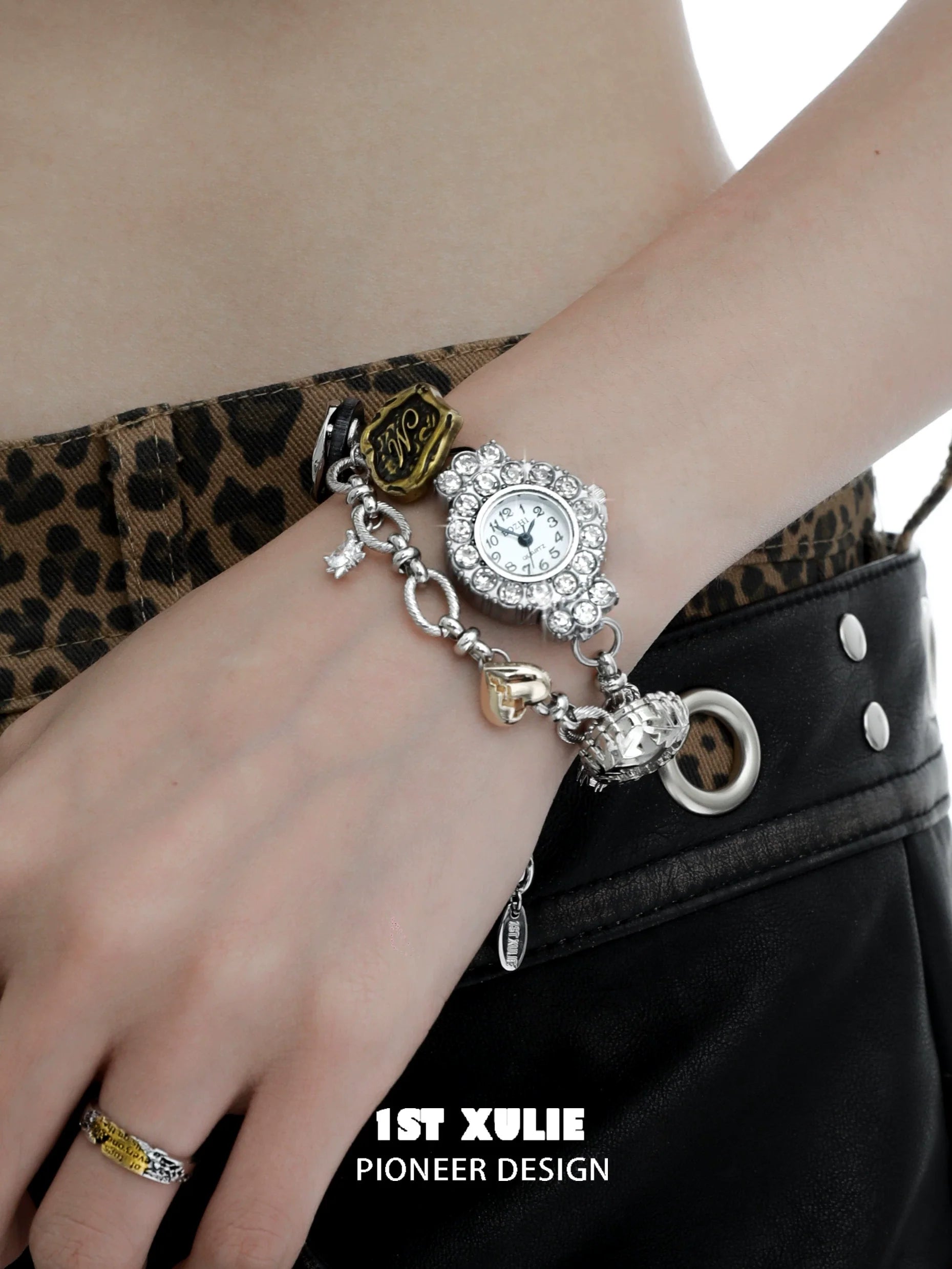 Y2K vintage bracelet watch with rhinestone accents and charm details on a wrist